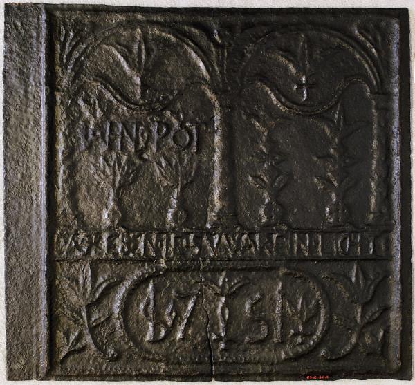 Photo of the cast iron plate made by John Potts at Warwick or Pottsgrove Furnace, 1751; stove plate features German words that translate "the Life of Jesus was a light". 