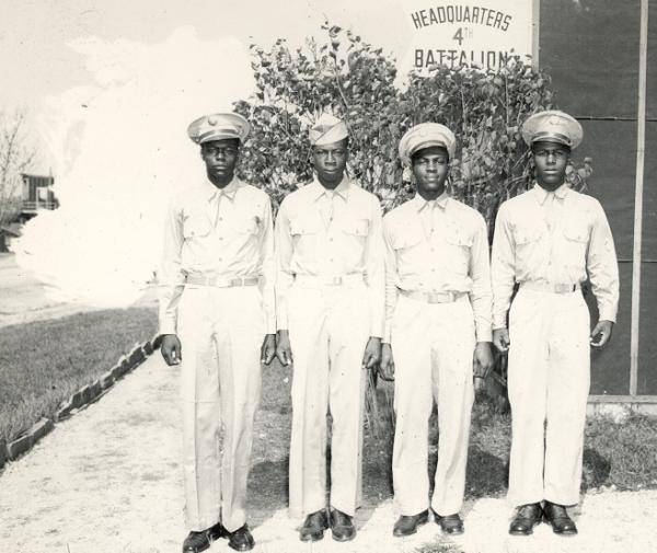 Photograph of four uniformed African-Americans.
