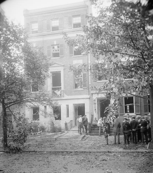 Group of people in front of home of Alexander Mitchell Palmer, after bomb explosion, 1919.
