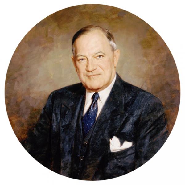 Head and shoulders circular painting of Wagner wearing a suit and tie.