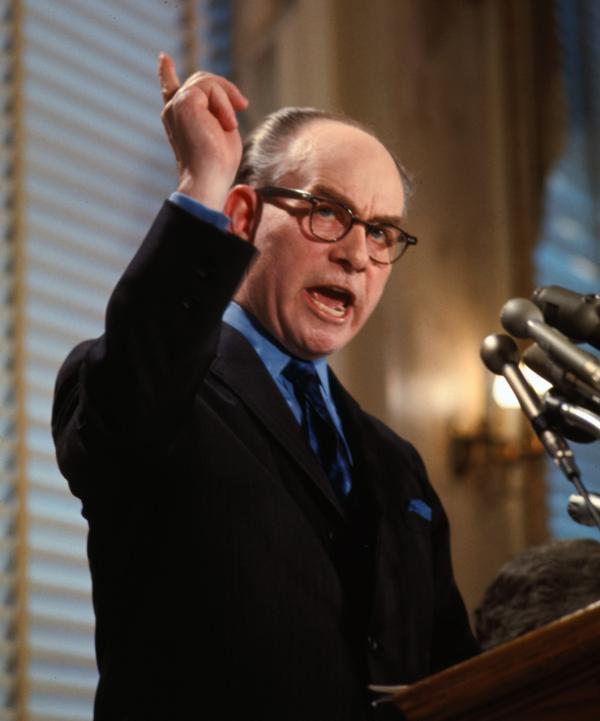 A color photograph of W.A. "Tony" Boyle, president of the United Mine Workers of America, gesturing during a two hour news conference at the National Press Club.