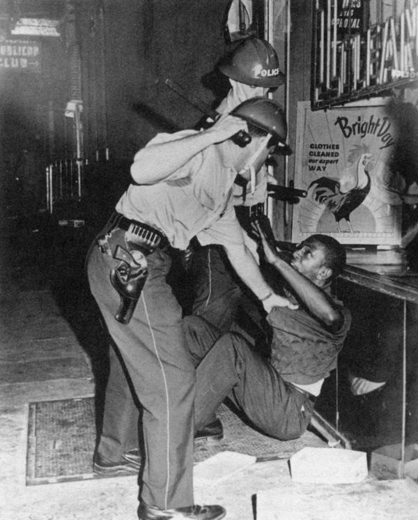 Police have an altercation with a black man on Columbia Avenue, Philadelphia, Pa., August 28, 1964.