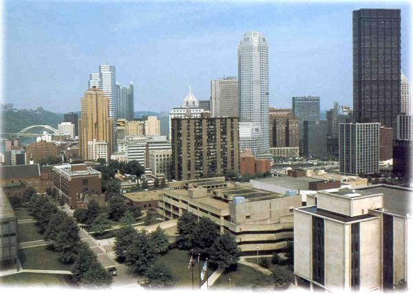 The modern urban university, with campus buildings integrated into the commercial skyline. 
