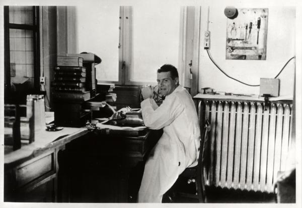 Dr. Anfinsen at his desk 