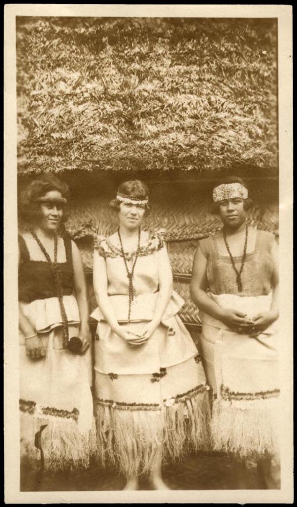 Margaret Mead sitting between two Samoan girls, ca. 1926. Gelatin silver print