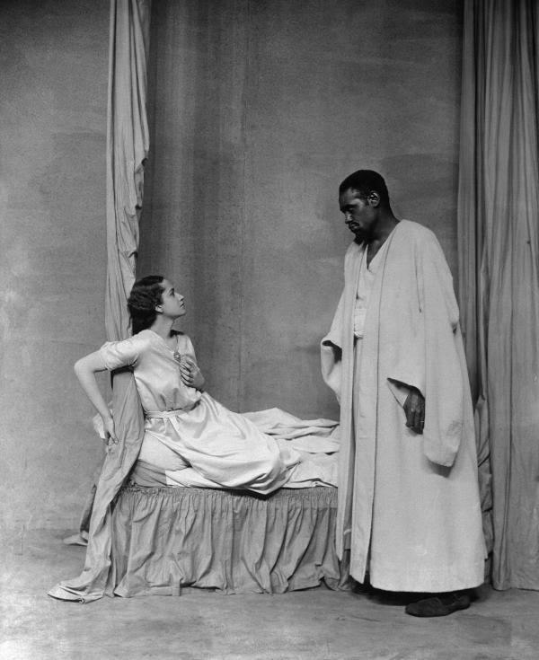 Paul Robeson as Othello, standing over English actress Peggy Ashcroft as Desdemona. London, 1930.