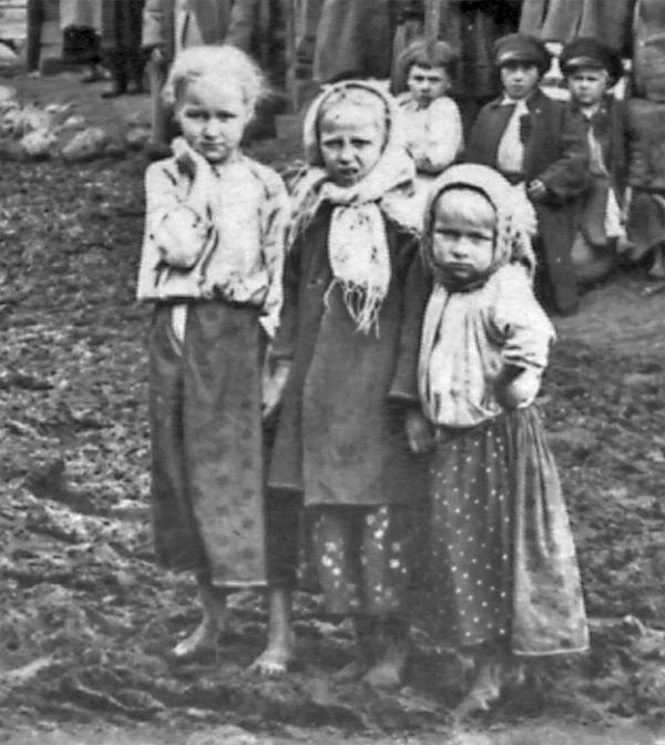 There are three children in the foreground and three in the background.