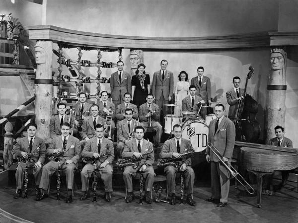 1941- Tommy Dorsey and his band. On the far right in the last row is a very young and yet unknown Frank Sinatra. Movie Still from, "Las Vegas Nights".