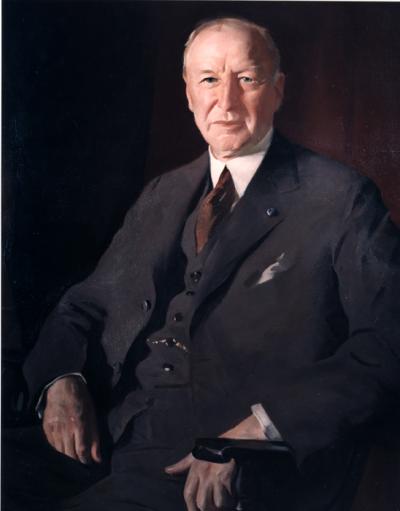 Oil on canvas of John S. Fisher, wearing a suit. 