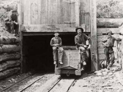 Anthracite mine workers often included young boys such as those depicted here at the entrance to a drift mine in the anthracite region. The anthracite industry peaked in 1917 when one hundred million tons of coal were mined and processed by over 160,000 workers.