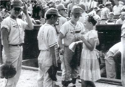 Black and white baseball card depicting a young female fan seeking autographs from the Connecticut team.