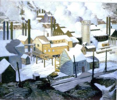 Birds-eye view of a steel mill in winter, with a number of yellow, blue, and brown buildings nestled among a forest of chimneys. 
