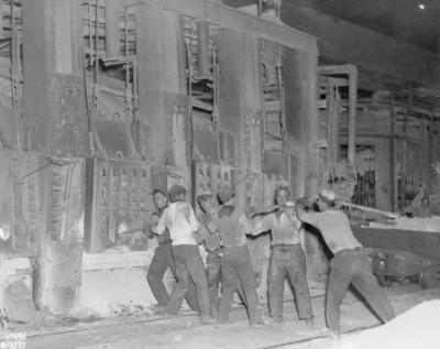 Image of steel workers at the Open Hearth, Tapping Heat.