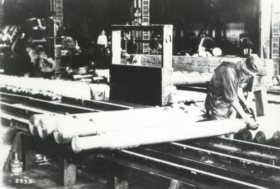 Interior image of workers in the axle shop.