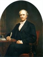 Oil on canvas painting of Simon Cameron, dressed in a dark suit is seated a desk and is holding a quill pen.