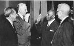Robert N. C. Nix taking his oath as Congressman, sworn in by House Speaker Pro Tem John W. McCormack (D-Mass) second from left. Also participating in the ceremony were Philadelphia Congressman William J. Green Jr., (left) and Congressman Francis E. Walter of Easton, PA (right), who was head of the Pennsylvania Democratic Delegation.  January, 1959