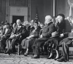 Seated in a row are Left to right, just before the President spoke are: Mrs. Hoover; President Hoover; Mrs. A. Hampton Moore, wife of the Mayor of Philadelphia, and William H. Vare, former Pennsylvania Senator and Republican leader of Pennsylvania. 