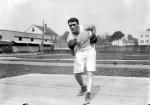 Jack O'Brien in a boxing stance, posing for photo.