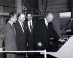 Professor of nuclear engineering William Breazeale, Penn State president Milton S. Eisenhower, dean of engineering Eric Walker, and U.S. President Dwight D. Eisenhower at the dedication ceremony for the research reactor, February 22, 1955. 