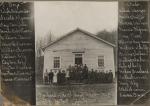 Exterior, Birchardville One Room School with students posing in front.'