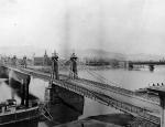 The Pittsburgh-Allegheny Bridge, ( the site of today's Smithfield Street Bridge), built by John Roebling in 1846. 