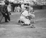Little League player steals home in Little League World Series semi-final game, 1954.
