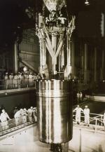 Fifty-eight-ton reactor core being lowered into the pressure vessel 