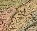 A colorful map with a close up of Mifflin County, where roads, railroad routes, canals and rivers intersect.