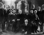 Representatives of participating nations gather at Independence Hall in Philadelphia on October 26, 1918 to sign the Declaration of Common Aims of the Independent Mid-European Nations. Seated at the center, directly under the crack of the Liberty Bell, is Dr. Thomas G. Masaryk.  