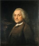 Color portrait of Benjamin Franklin wearing a brown suit with a white dress shirt showing at the collar area. 