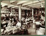 Image of Burpee female employees working in the seed packing plant. 