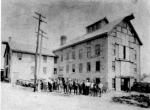 Black and white image of Doylestown Agricultural works with workers.
