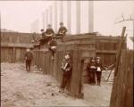 The earliest image to juxtapose children with Pittsburgh's smokestacks. Gelatin silver print.'