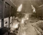 A dynamic image of the inside of Duquesne Steel and a worker tapping iron from a blast furnace.