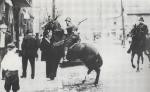 State Trooper assaulting bystander in Homestead, 1919.