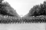  he 28th Infantry Division marching in front of the Champs Elysee in Paris, France. August 29, 1944.