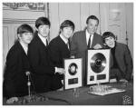 Image of Beatles and Alan Livingston. From left to right, Ringo Starr, Paul McCartney, John Lennon, Allan Livingston, and George Harrison.