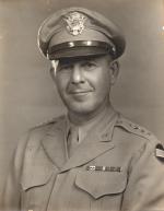 Black and white portrait of Jake Devers in uniform.